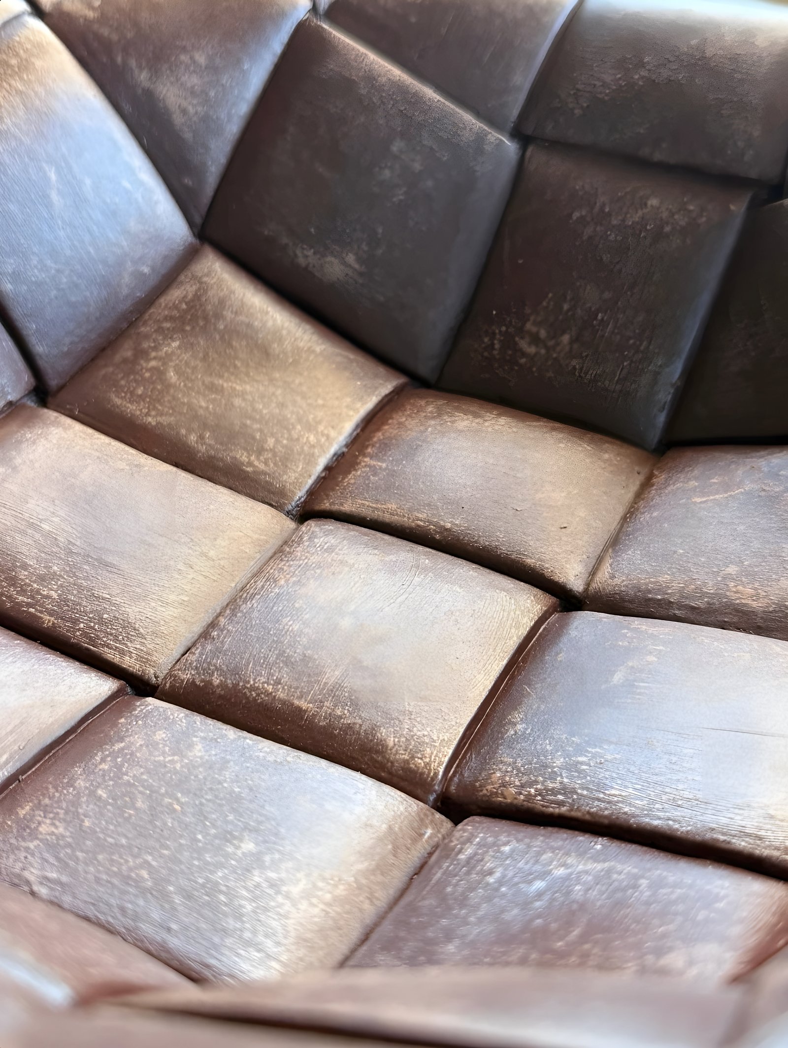 Woven ceramic surface in warm light